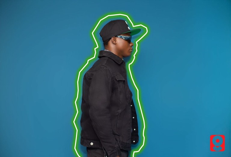Neon outline portrait of DJ Kenny in profile
