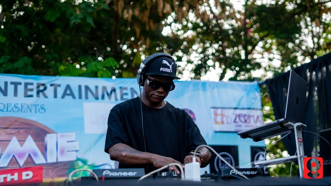 DJ Kenny playing an outdoor daytime set